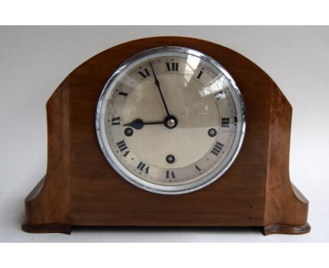 A mahogany mantle clock