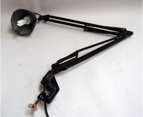An anglepoise lamp with desktop clamp