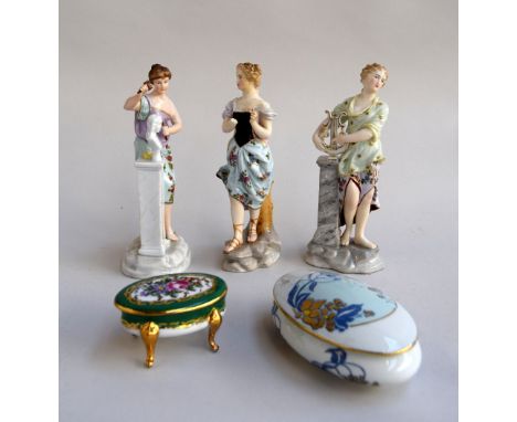 Three continental figurines of women, marks to base; 17cmH together with two Limoges porcelain trinket dishes with lids
