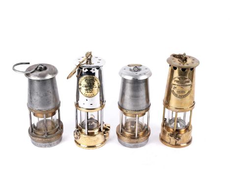 Four miners’ lamps, to include: two ‘The Wolf’ safety lamps, both 22cms; an Eccles ‘Type GR6S’ protector; and another Eccles 