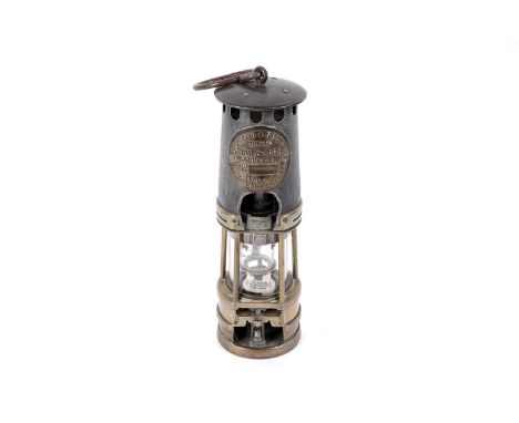 A ‘Type O.I.B Hailwoods Improved Lamp’, by Ackroyd and Best Ltd Morley, Leeds England, cut-away to show the inner workings.