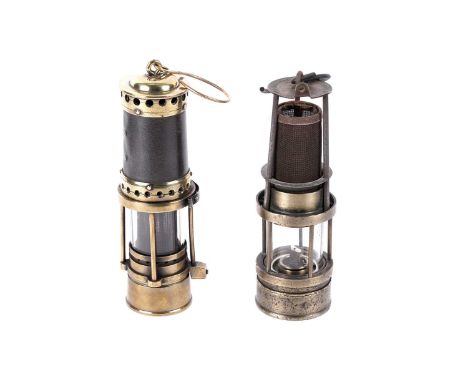 Two miners’ lamps: a bonneted Clanny type four bar miners’ lamp, unnamed, stamped ‘44’, 26cms; and a Richard Johnson Clapham 