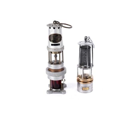 Two miners’ lamps, a J.H. Naylor Ltd Wigan ‘Spiralarm Type S For The Detection of Combustible Gases’, 36cms; together with an