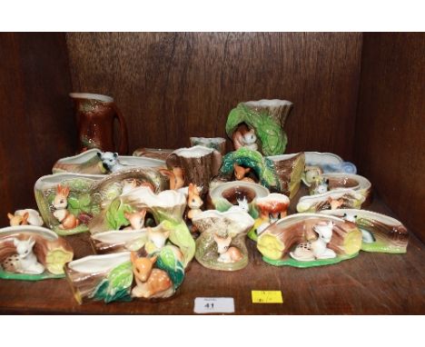 SECTION 41. A shelf lot of assorted Hornsea animal vases.