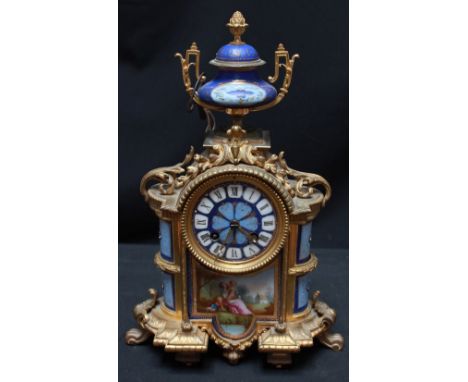 A 19th century French ormolu and porcelain mantle clock By LeRoy & Sons of Paris, surmounted by an urn finial, the body with 