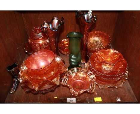 SECTION 47. A shelf lot of Carnival glass.