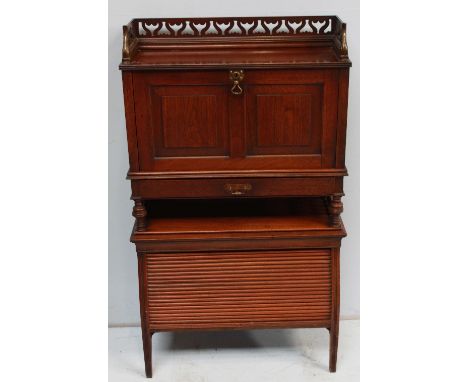 Attributed to Jas Shoolbred, an Edwardian stained walnut Bureau, with three-quarter pierced fretwork gallery above a fall-fro