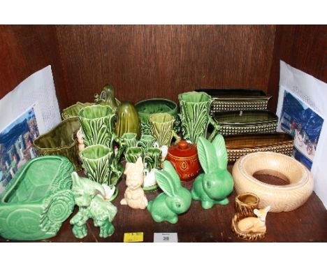 SECTION 38. A shelf lot of assorted Sylvac platers and rabbits.