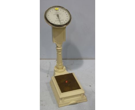 A Salters No.216 "Compact" Weighing Machine, painted white, 83cm high