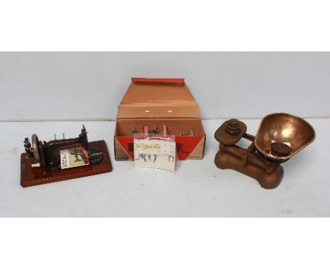 A Zyliss bench vice, a Victorian Atlas sewing machine and a heavy set of kitchen scales with weights (3).
