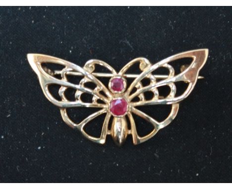 A 9ct gold and ruby butterfly brooch.