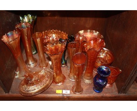 SECTION 44. A shelf lot of Carnival glass.