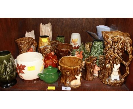SECTION 37. A shelf lot of assorted Sylvac figures and animal vases.