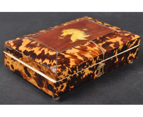 A 19th Century George III tortoiseshell veneered trinket box having a mahogany panel top with stencilled horse decoration. Br