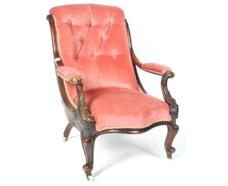 A 19th Century Victorian mahogany library reading club armchair / arm chair. The chair with button back rest with cushioned a