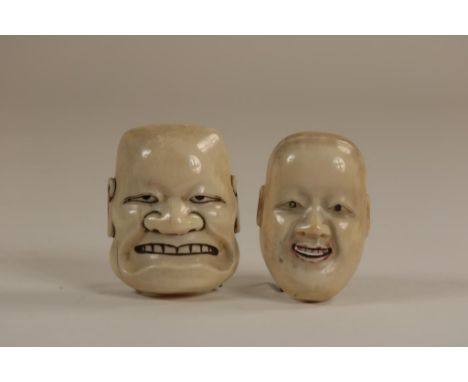 a pair of carved ivory Noh masks Netsuke, 2x signed, Japan ca.  1900, h. 5.5 cm.   The item comes with two certificate of aut