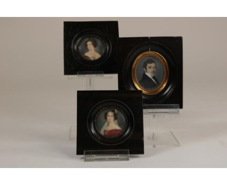 a pair of portrait miniatures of a lady on ivory, signed v. Hall,  Germany ca. 1900, 9 x 9 cm. and a miniature portrait of a 