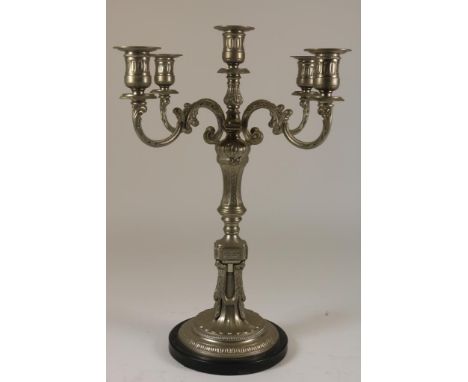 Plated 5-ligths candlestick holder, h. 58 cm.Plated 5 lichts kandelaar, met guirlandes gedecoreerd, h. 58 cm.