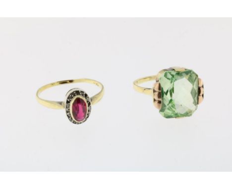 Two yellow gold rings, set with synt. ruby and diamond and with a  green synt. spinel, ca. 1930. 585/000, gross w. 4.5 gr., s