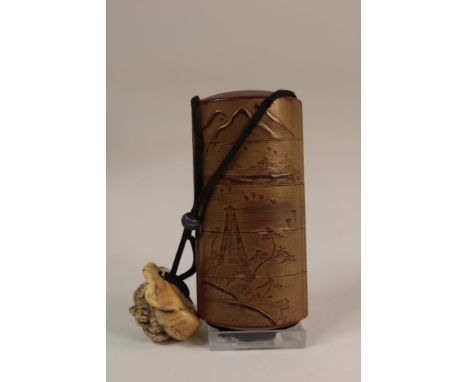 Goldlaquerwork Inro with Ojime and ivory netsuke, Japan ca.  1900, h. 4.5, w. 3, d. 3 cm.  The item comes with a certificate 