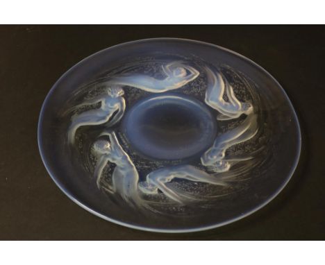 Art Deco, blue opalescent glass dish, relief decorated with  frolicking sea nymphs, signed R. Lalique France, diam. 28 cm.Opa