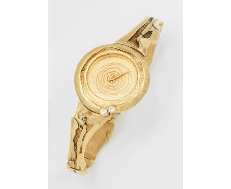 Extravagante Damenarmbanduhr mit BrillantenGelbgold, gest. 585. Amorph gestaltetes Armband mit korrespondierendem Gehäuse, be