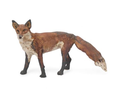 ELAINE PETO (b.1963), British, a rake ceramic figure "Fox who got the chicken", makers stamp, length 38cmGood condition, no c