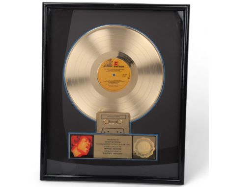 JIMI HENDRIX EXPERIENCE a GOLD DISC presented to MITCH MITCHELL to Commemorate The Sale of More Than 500,000 Copies Sold of t