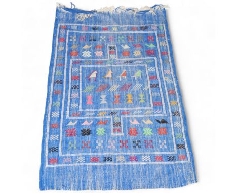 A vintage hand woven wool rug or wall hanging, blue ground with geometric border, possibly Sardinian, 140 x 87cmGood vintage 