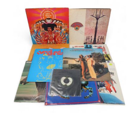 A collection of VINYL LPs owned by MITCH MITCHELL. Titles include: Johnny Guitar Watson 'Funk Beyond The Call of Duty' (UK co