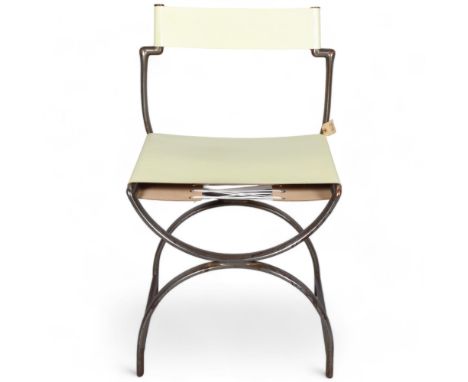 AMBROSE HEAL, a rare 1930s Art Deco or modernist curule chair in oval section tubular steel with later leather. This design w