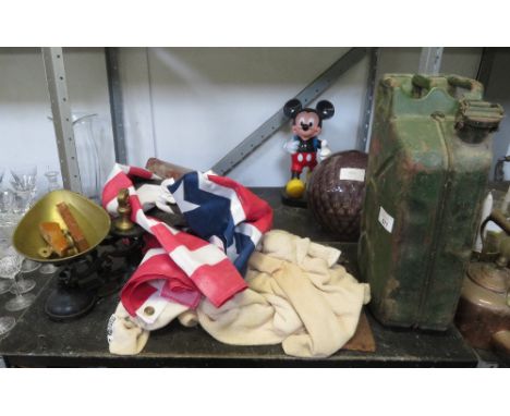 SHELF OF ITEMS TO INCLUDE MICKEY MOUSE FIGURE, COUNTRY FLAGS, SCALES, JERRY CAN ETC