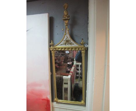 A GOOD REGENCY STYLE GILTWOOD AND GESSO MIRROR the rectangular plate between reeded pilasters with Corinthian capitals the sh