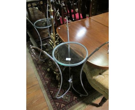A PAIR OF ITALIAN CHROME PAINTED JARDINIERE STANDS c.1930 each with a circular glazed top raised on scroll supports with ring