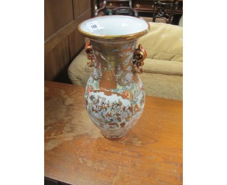A PAIR OF CHINESE VASES each of baluster form the white and gilt ground decorated with figures amongst stylized foliage and f