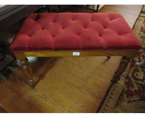 A VICTORIAN SATIN BIRCH STOOL the rectangular button upholstered seat raised on baluster legs with brass and porcelain caster