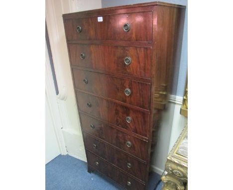 A MAHOGANY SEVEN DRAWER TALLBOY with brass ring handles 169cm (h) x 76cm (w) x 45cm (d)