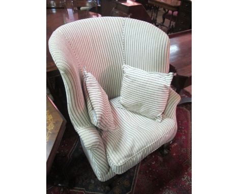 A MAHOGANY CHIPPENDALE STYLE TUB CHAIR with upholstered back and seat with loose cushion on cabriole legs with claw and ball 