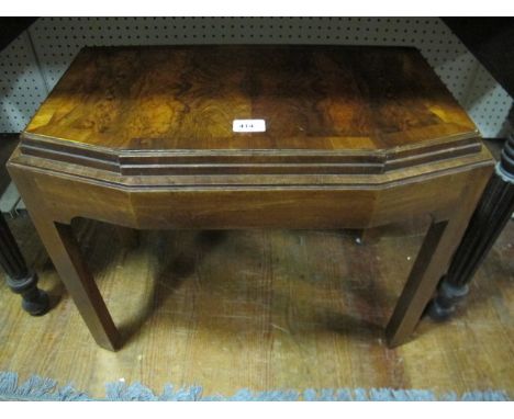 AN ART DECO WALNUT OCCASIONAL TABLE the stepped moulded top above a plain apron on moulded legs 50cm (h) x 60cm (w) x 34cm (d
