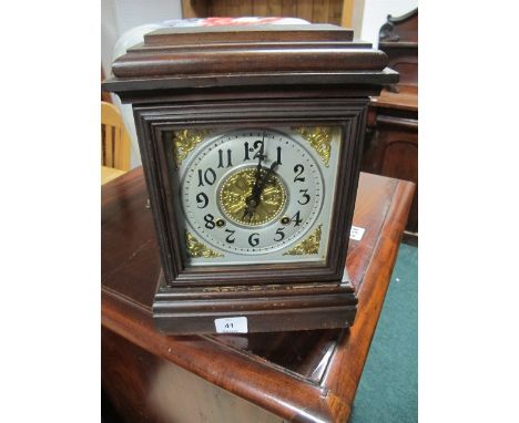 A STAINED BEECHWOOD MANTLE CLOCK of rectangular form with silvered and brass dial raised on a stepped base 34cm (h) x 24cm (w