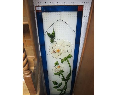 AN ART DECO GLASS PANEL with floral decoration 140cm x 40cm