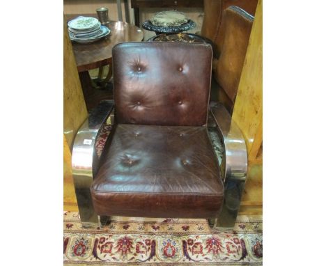 A HIDE AND CHROME DESIGNER ARMCHAIR the rectangular button back and seat with chrome arms and legs