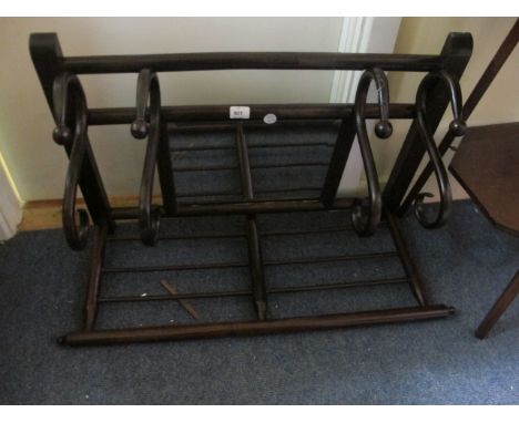 A BENTWOOD HAT AND COAT STAND with luggage rack above