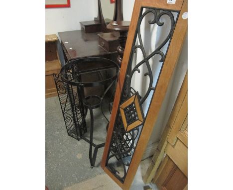 A PINE PANEL with inset metal decoration together with two wine racks and a jardiniere stand