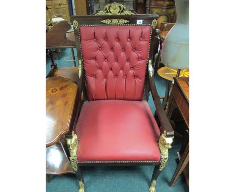 AN EMPIRE STYLE BEECHWOOD AND GILT BRASS MOUNTED ARMCHAIR the rectangular button upholstered back and seat with scroll arms r