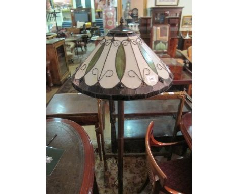 AN ART DECO STYLE STANDARD LAMP with bedded glass shade and moulded base 160cm high