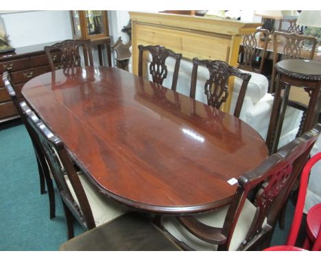 A SEVEN PIECE CHIPPENDALE STYLE MAHOGANY DINING SUITE comprising six chairs including a pair of elbow chairs each with a pier