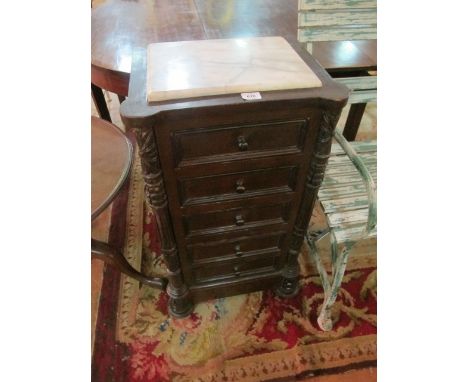A PAIR OF BEECHWOOD CHESTS each of rectangular outline with eared corners surmounted with a white vein marble top above five 