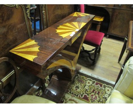AN ART DECO STYLE WALNUT SIDE TABLE the rectangular top with fan decoration above a frieze drawer on tapering support and spl