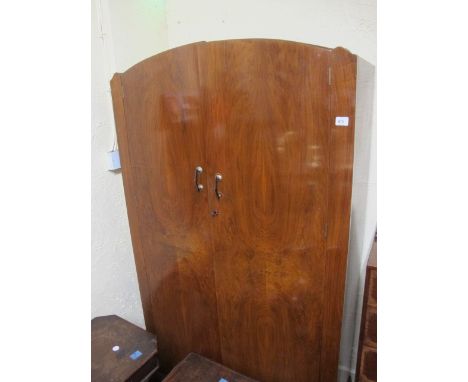 A ART DECO STYLE WALNUT TWO DOOR WARDROBE on shaped bracket feet 191cm (h) x 107cm (w) x 49cm (d)